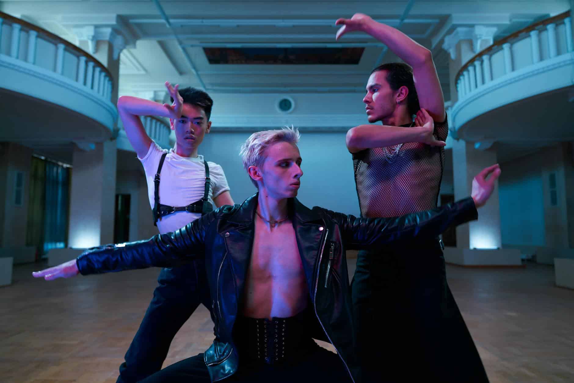 stylish men posing together