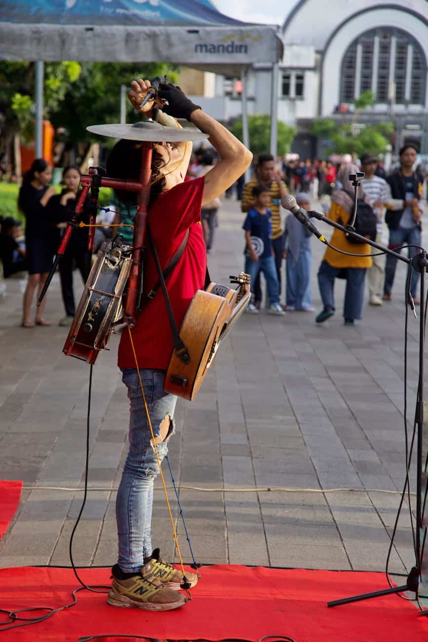 street musician performing with unique instruments